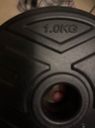 Juego de pesas ajustables.