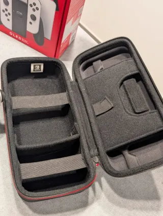 Nintendo Switch OLED con SD y funda de transporte