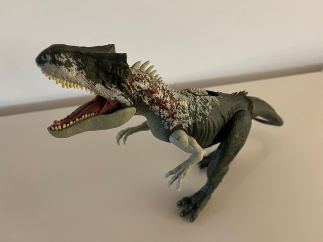 Dinosaurio de juguete como nuevo