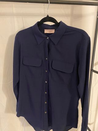 Camicia blu con tasche