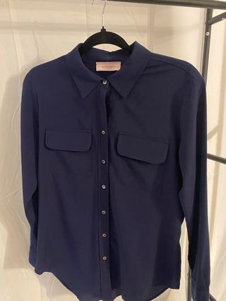 Camicia blu con tasche
