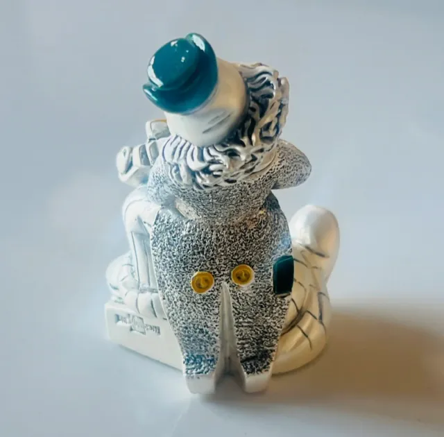 Payaso con violín baño plata