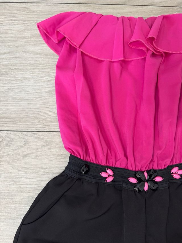 Tuta corta senza spalline fucsia e nera