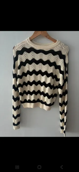 Jersey de punto con ondas beige y negro
