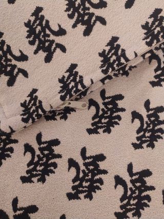 2 Fundas de cojín beige y negro