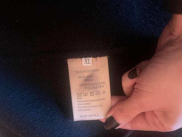 Abrigo negro doble botonadura