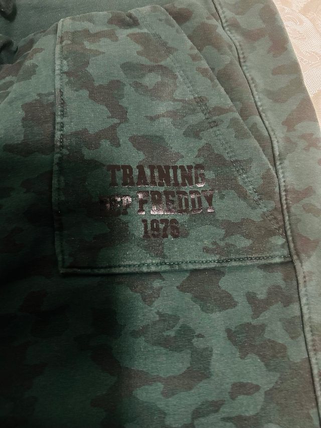 Tuta completa donna con cappuccio e zip