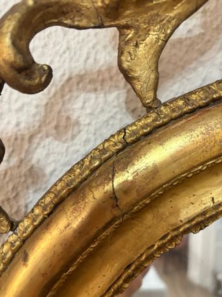 Espejo antiguo ovalado dorado