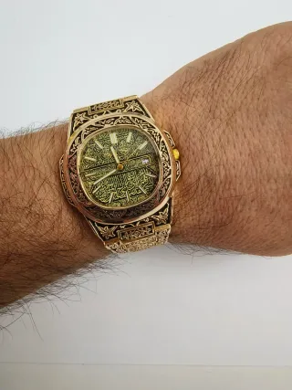 Orologio uomo oro e nero