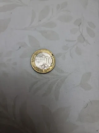 Moneda con retrato