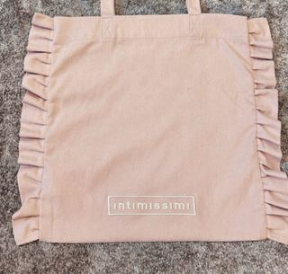 Bolso Intimissimi rosa con volantes y bordado