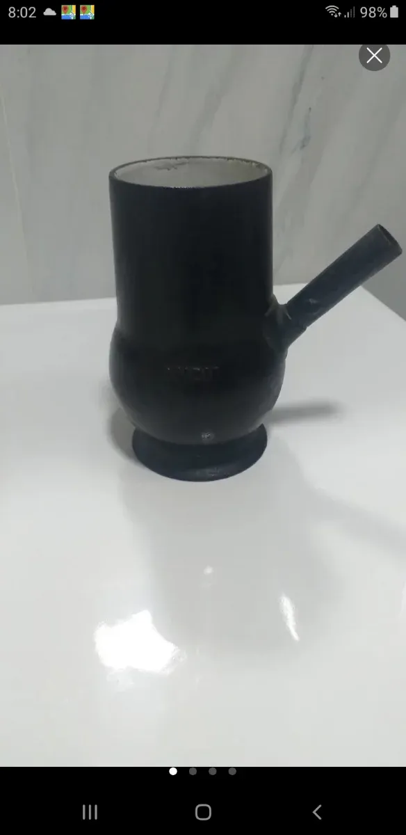 Antigua chocolatera de hierro Osiris