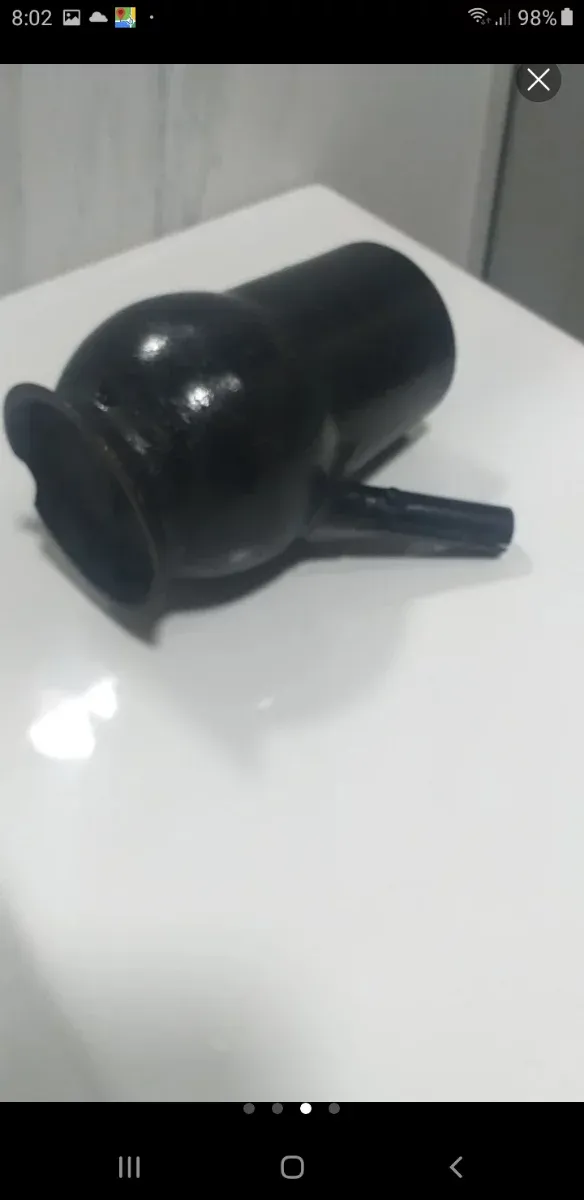 Antigua chocolatera de hierro Osiris