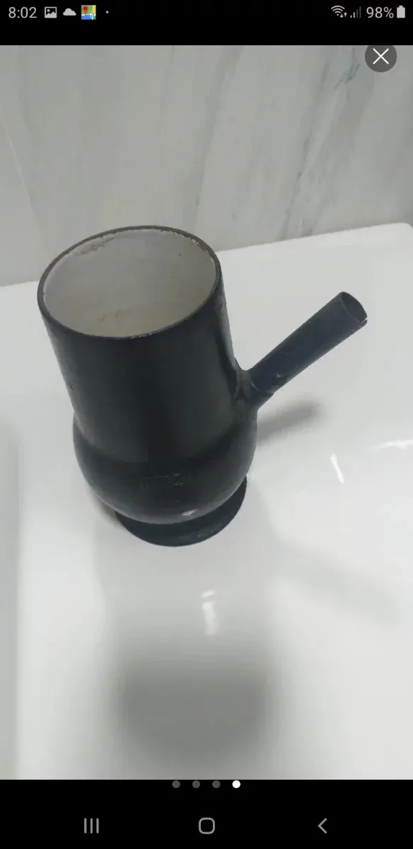 Antigua chocolatera de hierro Osiris