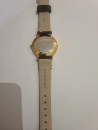 Reloj dorado y rosa