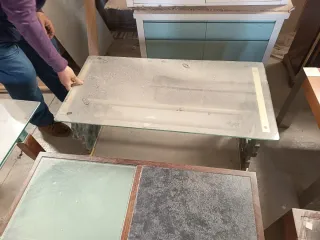 Mesas de centro madera y cristal.