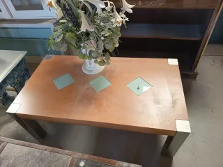 Mesas de centro madera y cristal.