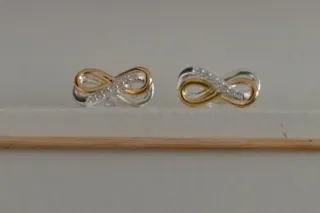 Pendientes infinito circonitas oro y plata
