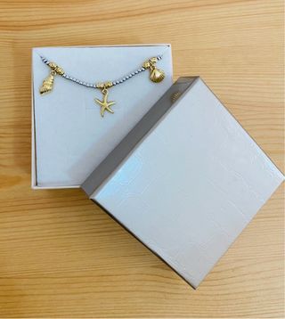 Braccialetto acciaio ciondoli mare