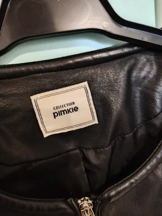 Cazadora efecto piel negra