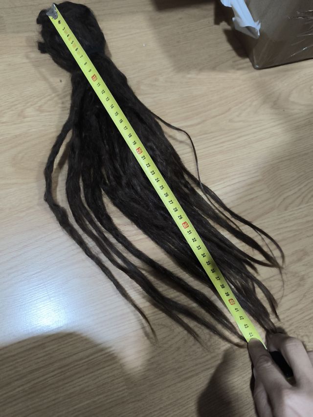 Rastas naturales pelo castaño oscuro