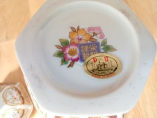 Jarrón porcelana decorativo pájaros y flores.