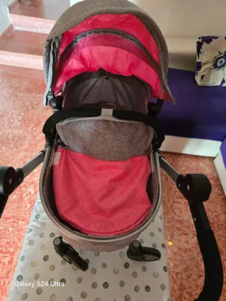 Carrito de bebé reborn gris y rosa