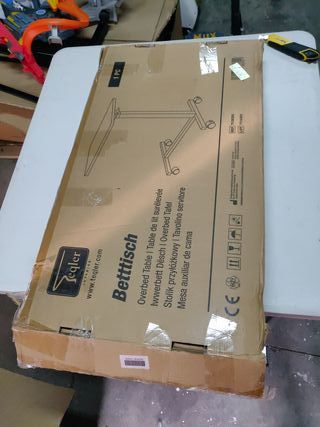 Mesa auxiliar gris con ruedas