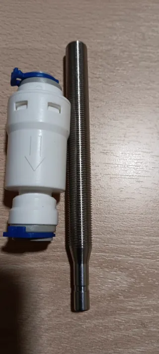Reductora de presión y alargo tubo o grifo.