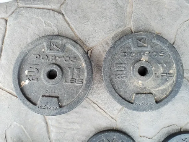 Barras de pesas cromadas de 28mm y discos también.