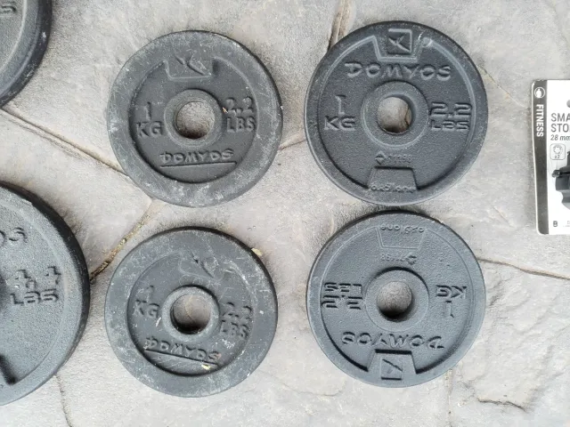 Barras de pesas cromadas de 28mm y discos también.