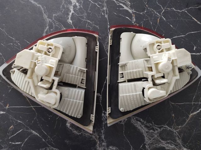 Fari Posteriori BMW E91 Cofano (Coppia) 7160063-64