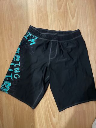 Bañador chico negro y turquesa