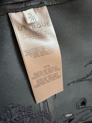 Chaleco Uterqüe piel negro flecos