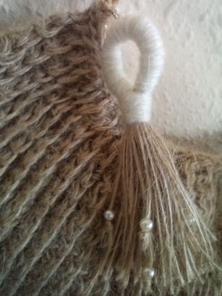 Bolso de mano tejido yute con aro dorado