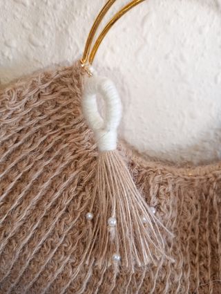 Bolso de mano tejido yute con aro dorado