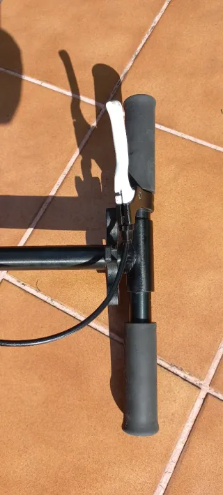 Patín Oxelo con freno y pata de cabra. Plegable.