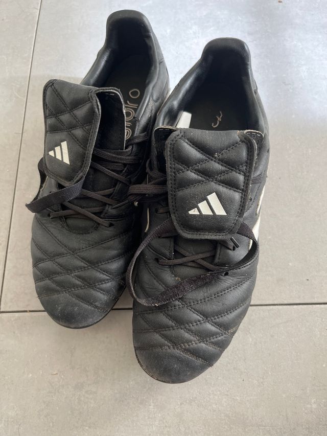 Botas de fútbol Adidas multitacos.Negociable