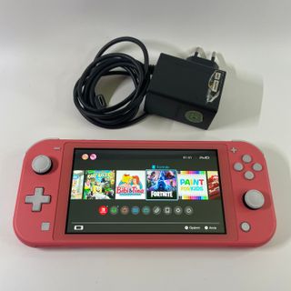 Nintendo Switch Lite Corallo con 6 Giochi