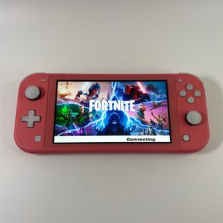 Nintendo Switch Lite Corallo con 6 Giochi