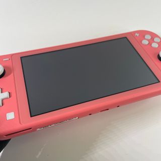 Nintendo Switch Lite Corallo con 6 Giochi
