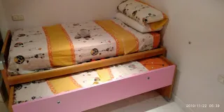 Cama nido madera y rosa