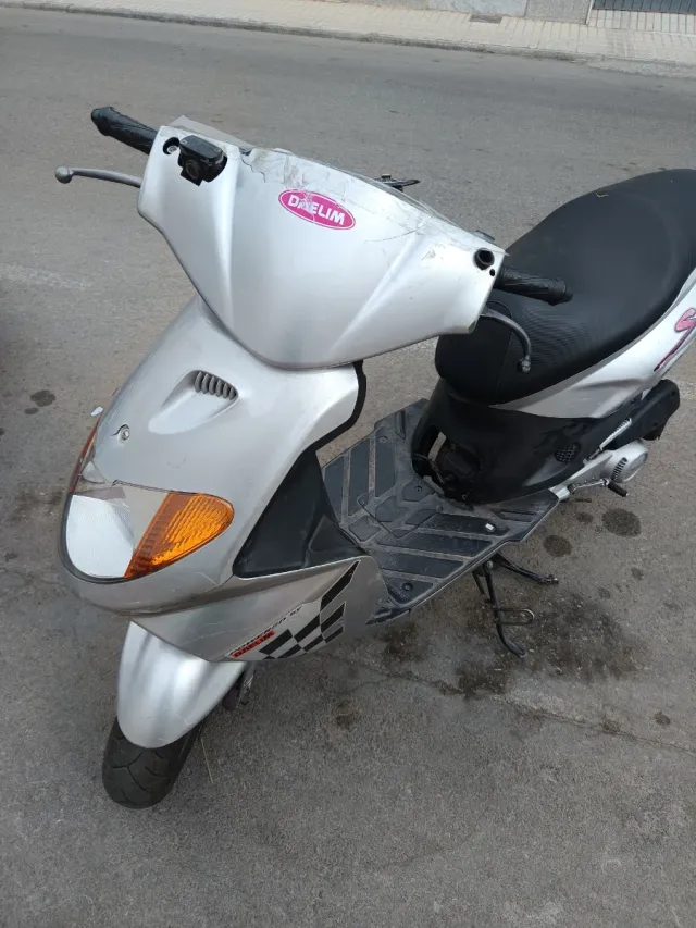 Scooter Daelim Plata