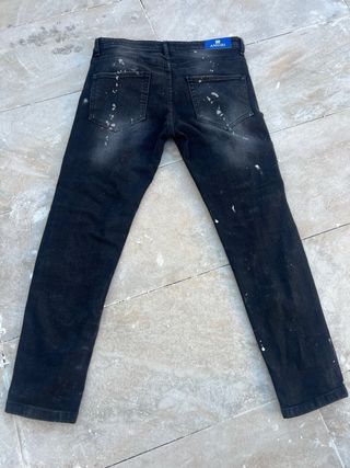 Vaqueros Amiri negros con salpicaduras
