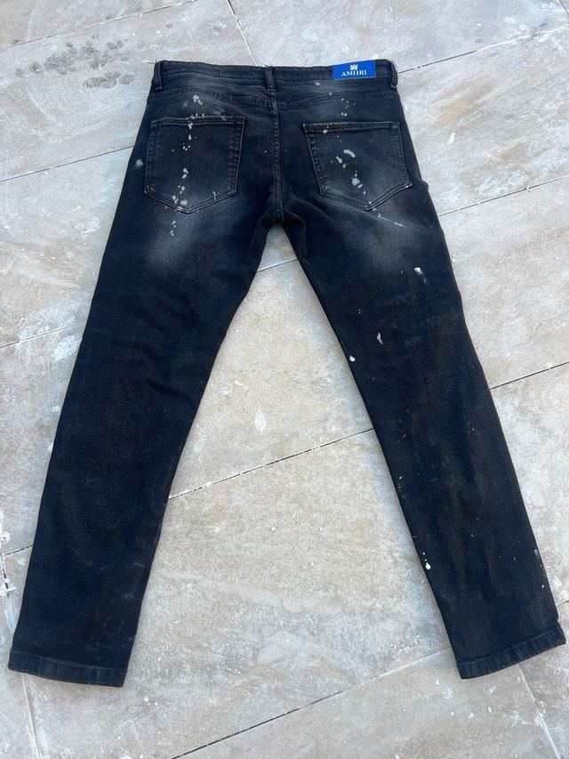 Vaqueros Amiri negros con salpicaduras
