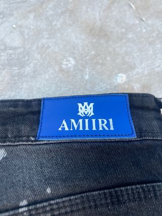 Vaqueros Amiri negros con salpicaduras