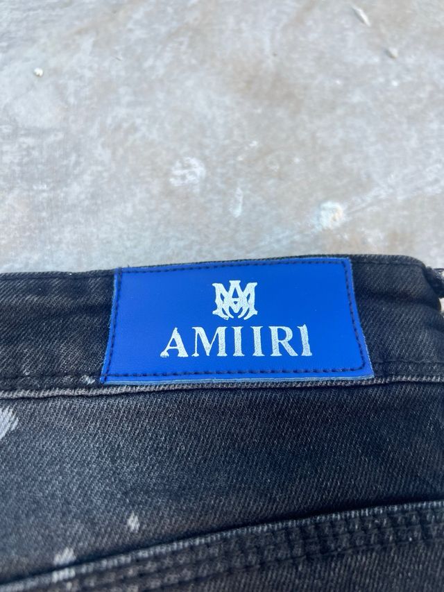 Vaqueros Amiri negros con salpicaduras