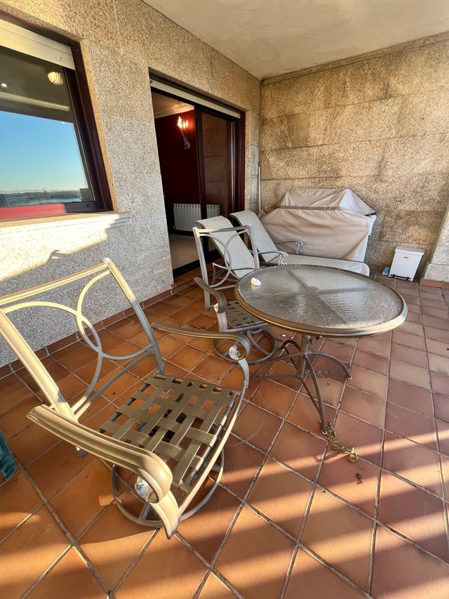 Conjunto mesa y sillas exterior con cojines