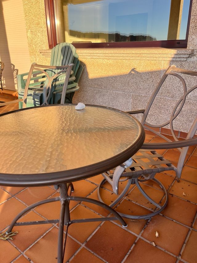 Conjunto mesa y sillas exterior con cojines