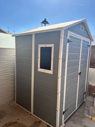 Caseta de resina exterior gris